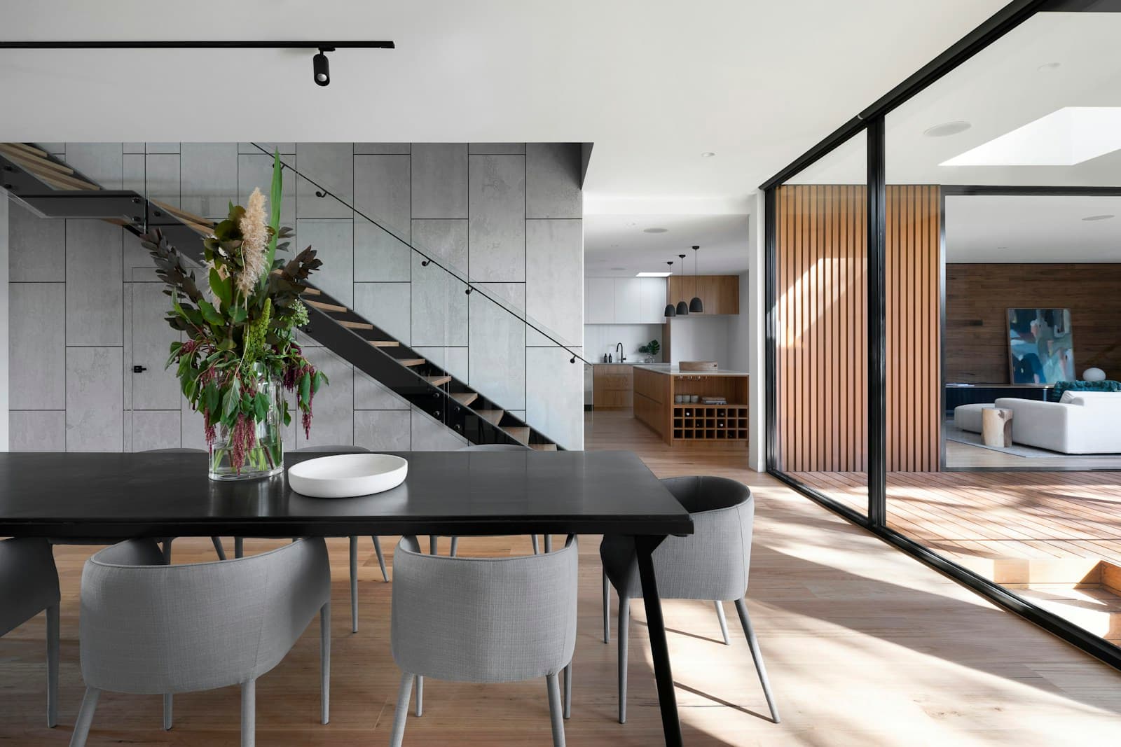 Illustrative light-filled home with natural materials and thoughtful interior details